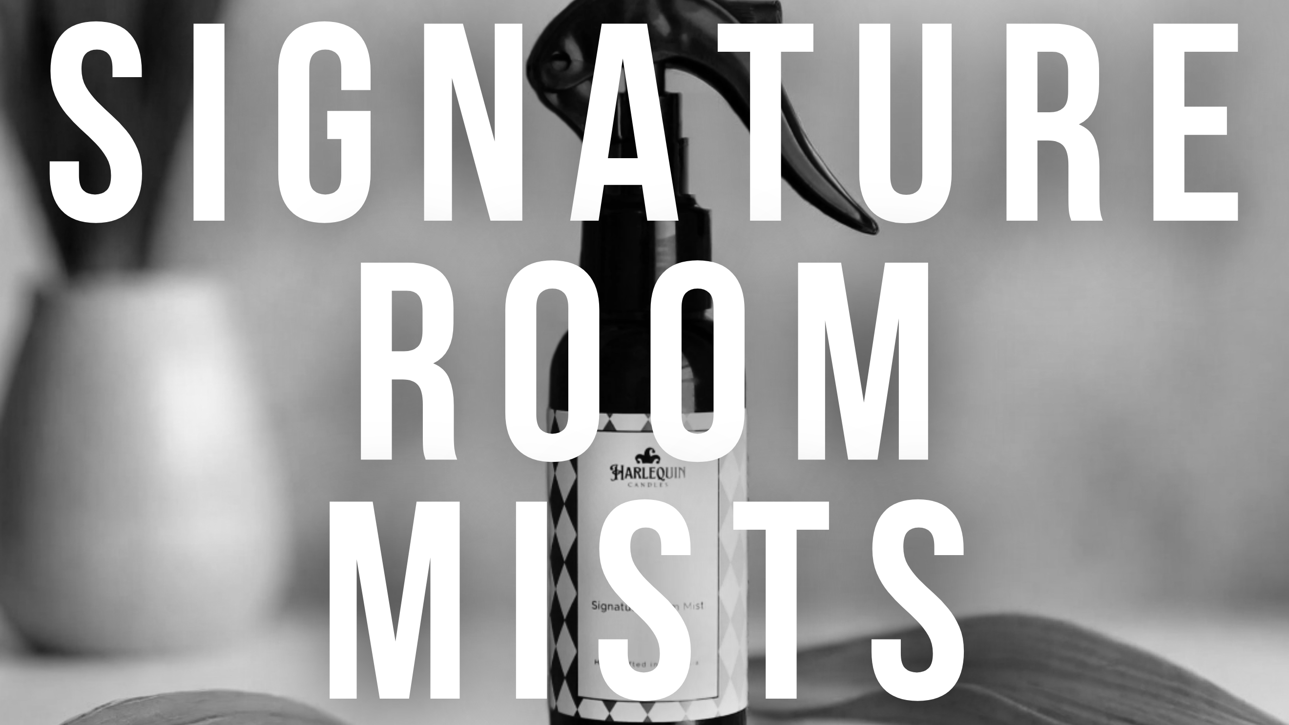 Monochrome banner with 'SIGNATURE ROOM MISTS' text prominently displayed. Features a Harlequin Candles room mist spray bottle in the foreground, with a vase of foliage in the background, highlighting the elegant home fragrance range.