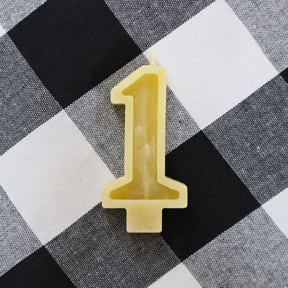 Handmade Australian beeswax number 1 birthday candle with a cotton wick for first birthday cakes.