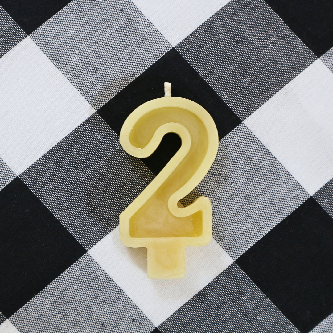 Handmade Australian beeswax number 2 birthday candle with a cotton wick for birthday cakes.