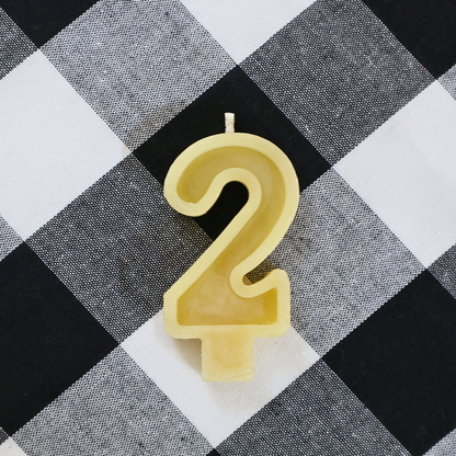 Handmade Australian beeswax number 2 birthday candle with a cotton wick for birthday cakes.