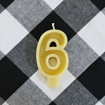 Handmade Australian beeswax number 6 birthday candle with a cotton wick for birthday cakes.