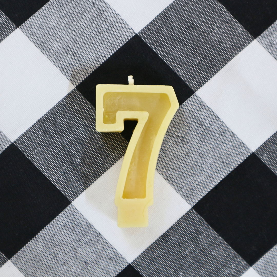Handmade Australian beeswax number 7 birthday candle for cakes and special celebrations.