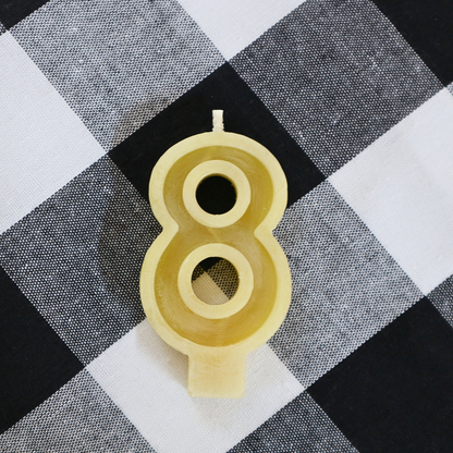 Handmade Australian beeswax number 8 birthday candle with a cotton wick for birthday cakes.