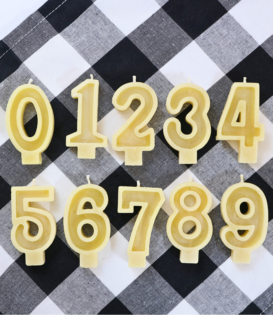 Handmade Australian beeswax number birthday candles from 0 to 9 for cakes, milestone birthdays and celebrations.