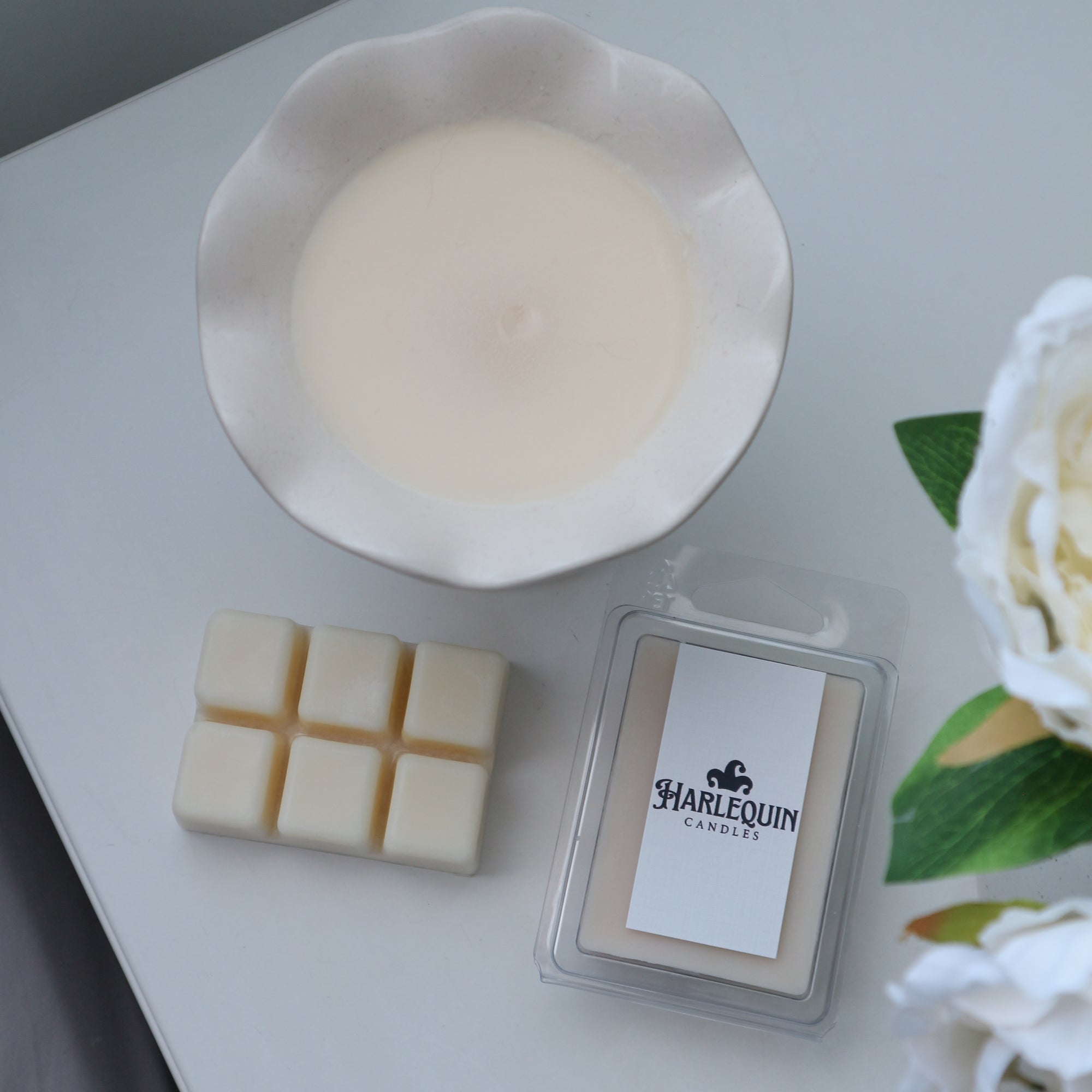 Harlequin Candles 100% soy Wax Melts with a wax melt burner.