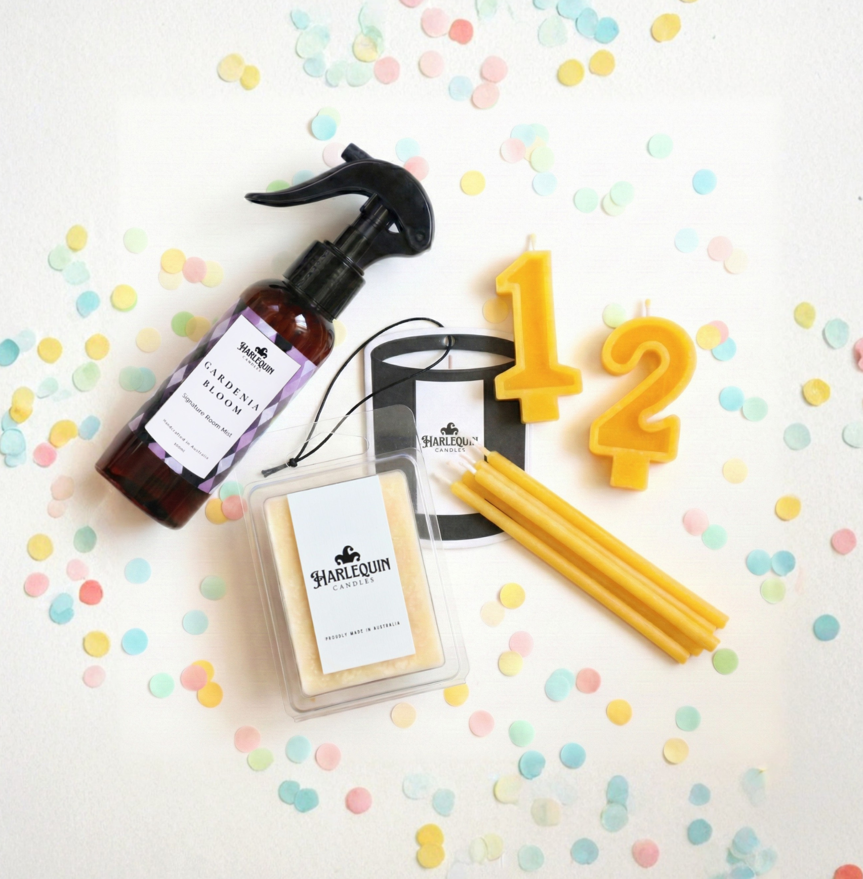 Harlequin candles under $15 products including room mists, beeswax cake candles and number candles and handmade soy melts.