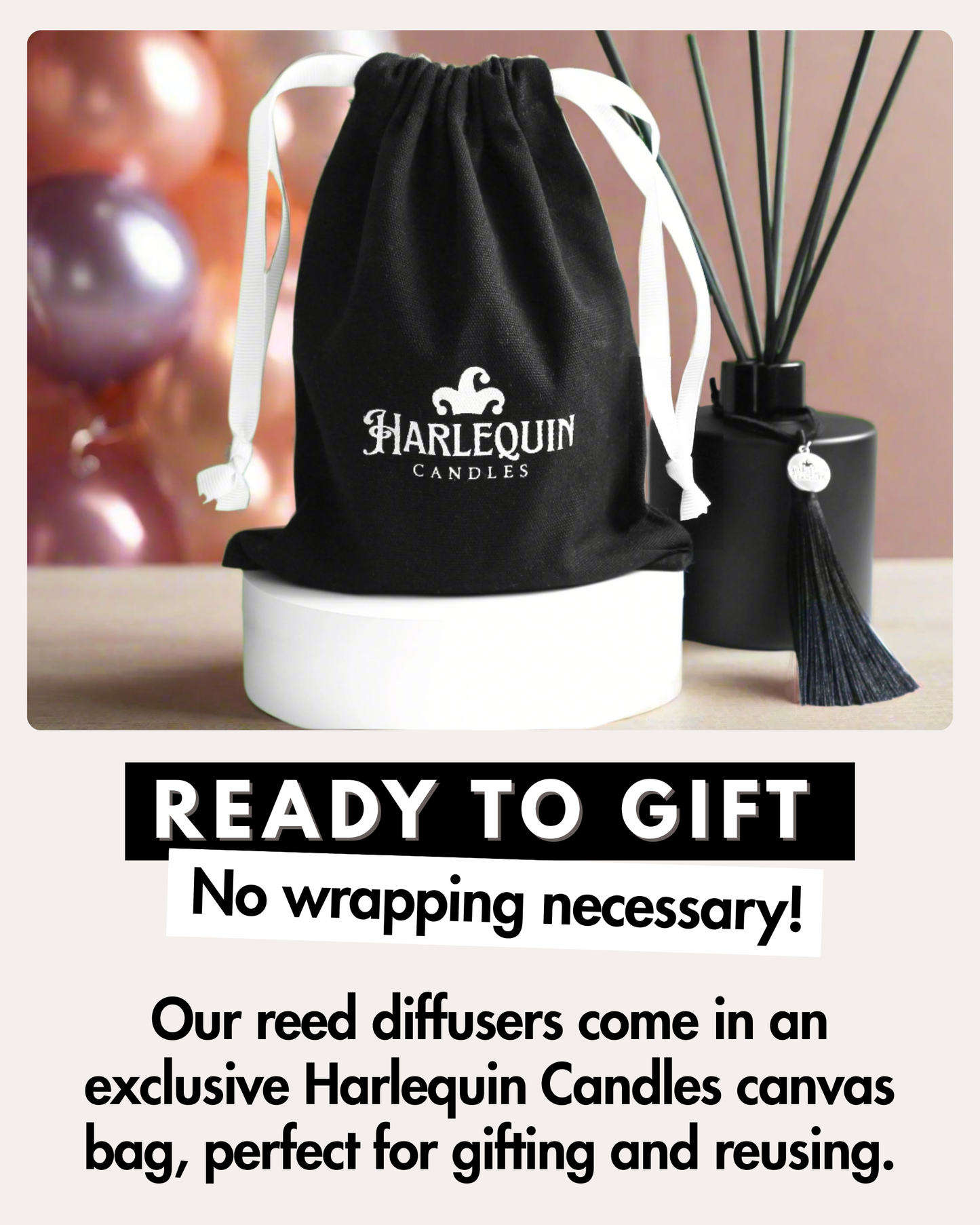 Harlequin Candles matte black reed diffuser with black reeds and tassel, displayed next to a black Harlequin Candles canvas drawstring gift bag with white ties. Large text reads 'READY TO GIFT No wrapping necessary!', highlighting the product's suitability for gifting and its reusable packaging.