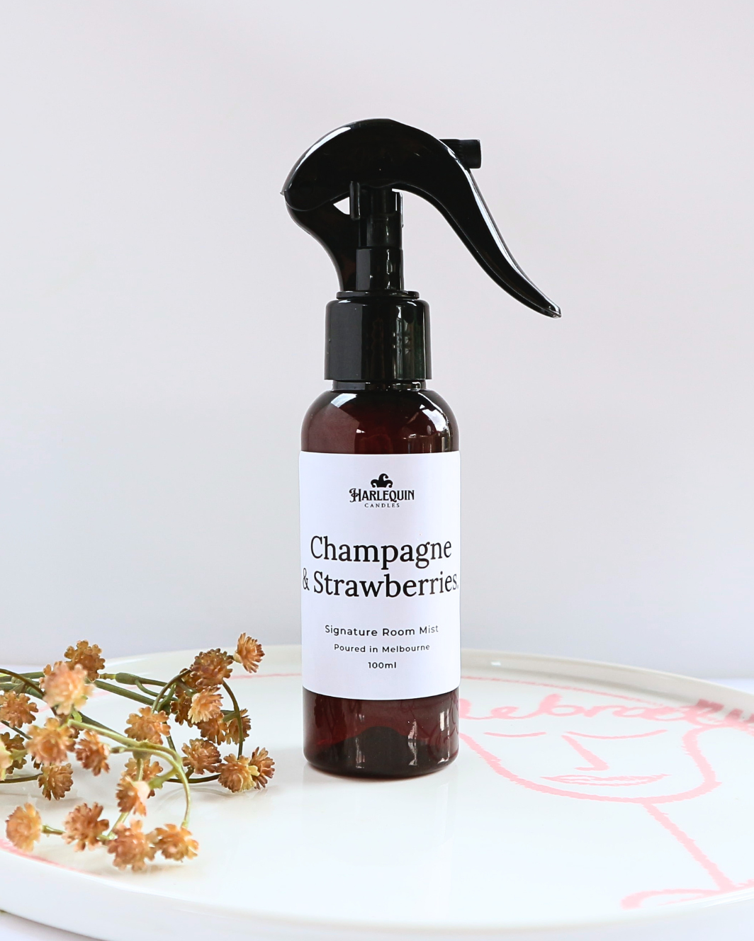 Handmade room mist in Champagne and Strawberries scent by Harlequin Candles, an affordable luxury home fragrance poured in Melbourne.