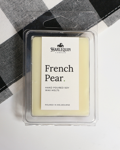 French Pear soy wax melts by Harlequin Candles, hand-poured in Melbourne with juicy pear, cinnamon, vanilla and clove in a clear clamshell.