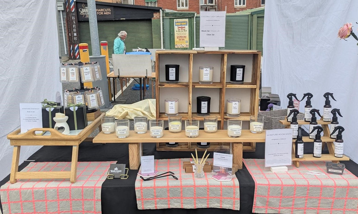 Harlequin candles Product display at a market stall at sunday bentleigh rotary market handmade home fragrance