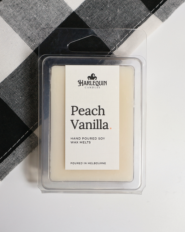 Peach Vanilla soy wax melts by Harlequin Candles, hand-poured in Melbourne with ripe peach, creamy vanilla and coconut in a clear clamshell.