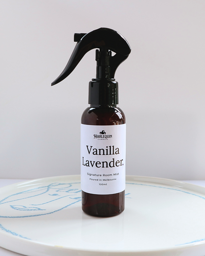 Harlequin Candles Vanilla Lavender 100ml signature room mist in a premium amber spray bottle on a minimalist white ceramic tray, hand-poured in Melbourne Australia.